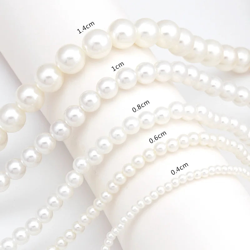 Elegante weiße Perlenkette mit großer runder Perle 