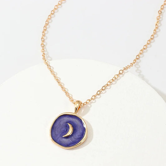 Halskette mit Mond- und Sternmünze
