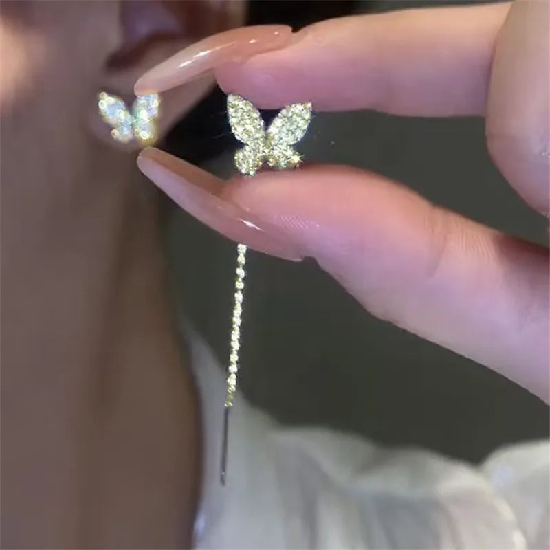 Pendientes largos con borlas, estrellas y corazones