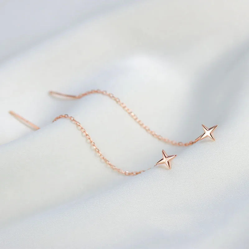 Pendientes largos con borlas, estrellas y corazones