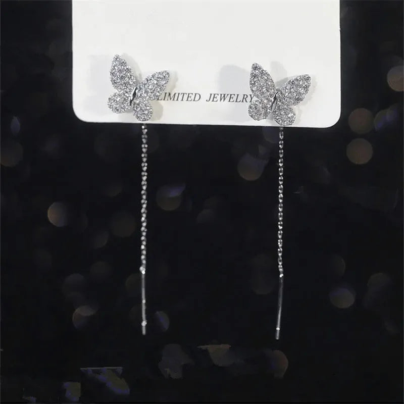 Pendientes largos con borlas, estrellas y corazones