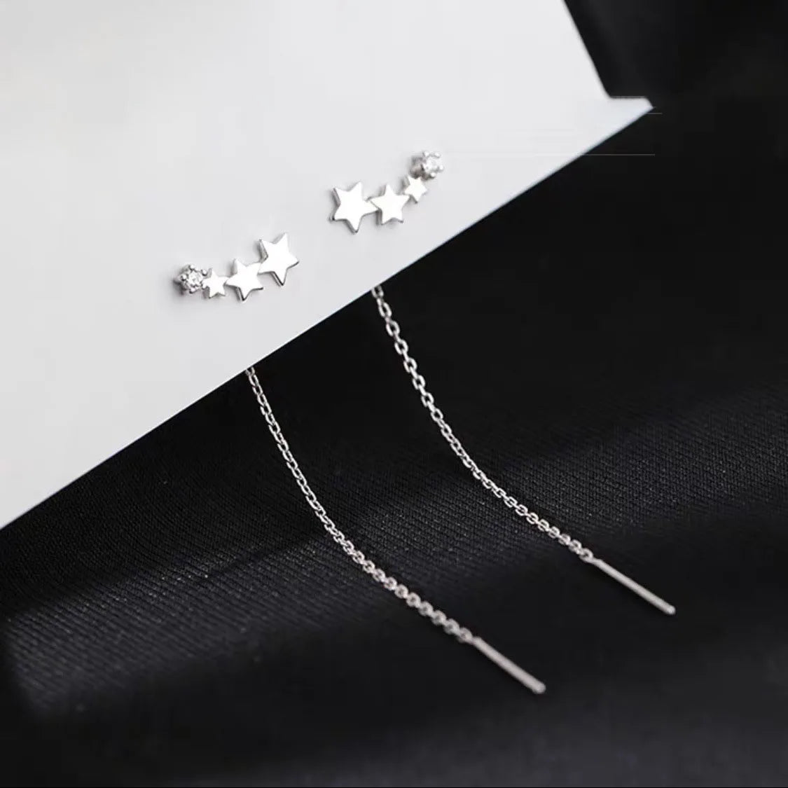 Pendientes largos con borlas, estrellas y corazones