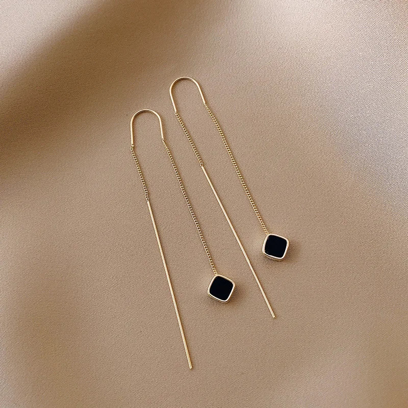 Pendientes largos con borlas, estrellas y corazones