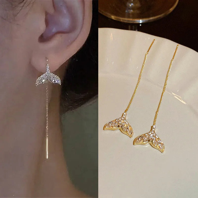 Pendientes largos con borlas, estrellas y corazones