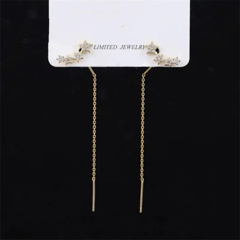 Pendientes largos con borlas, estrellas y corazones