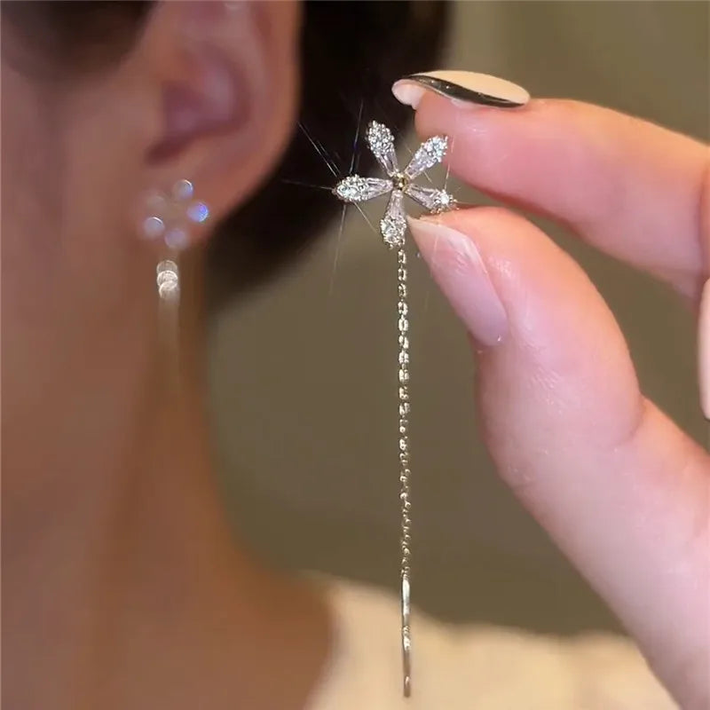 Pendientes largos con borlas, estrellas y corazones